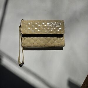 Charlotte Russe Quilted Patent Wristlet Clutch in Beige